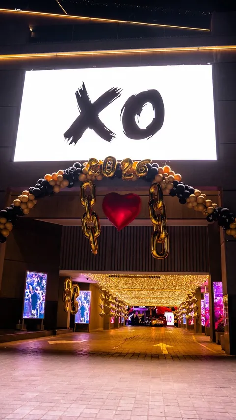 The lit entrance tunnel under the XO logo screen at XO Club Dubai