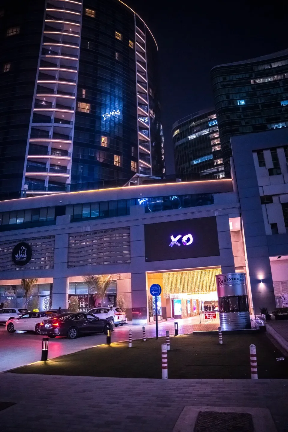 The XO Club Dubai sign and entrance at the Radisson Blu Waterfront Hotel at night